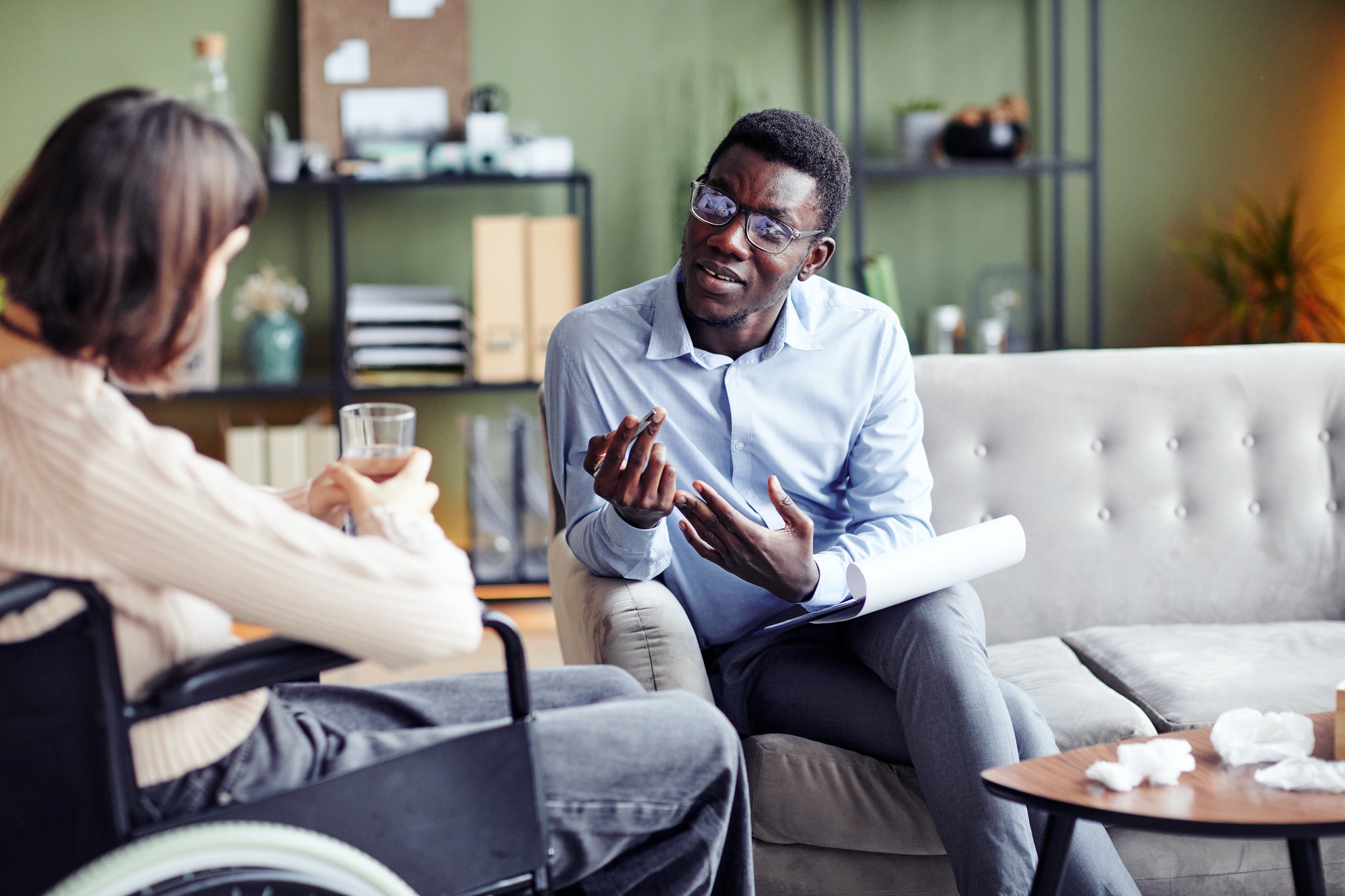 Psychologist Talking to Woman with Disability